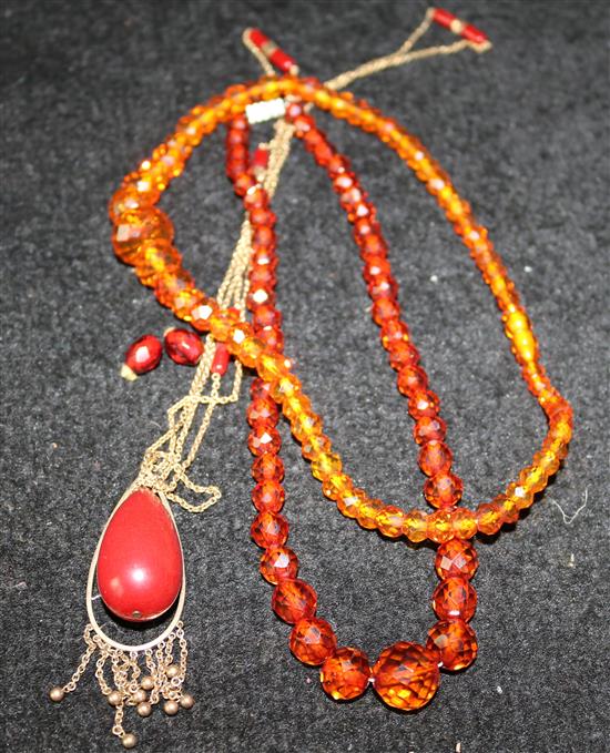 2 x amberoid necklaces and 1 red amberoid necklace